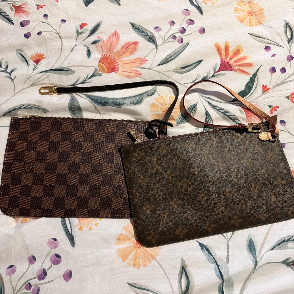 Two monogram pouches NEW